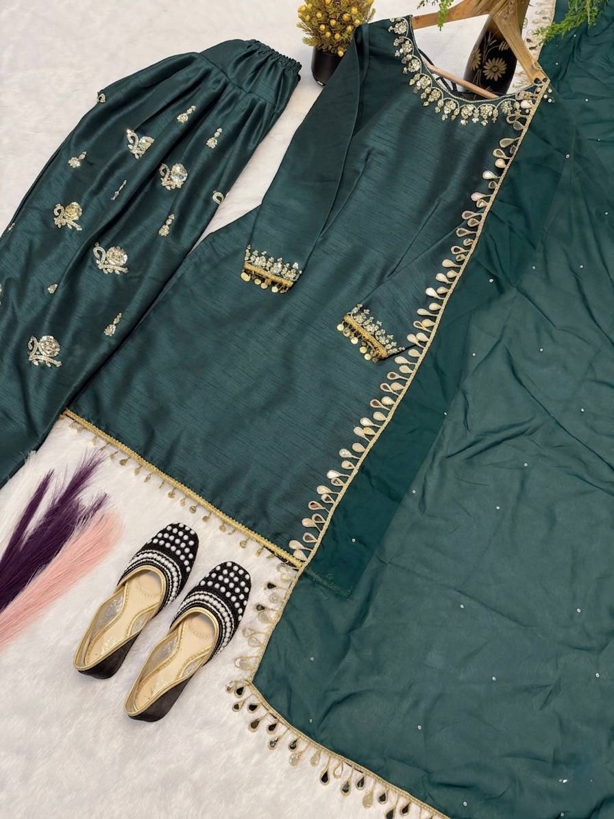 Majestic Emerald Green Kurta and Salwar Suit Set Featuring Intricate Gold Embroidery, Floral Motifs, and Ornate Coin Tassel Embellishments